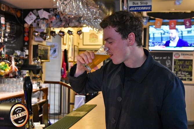 Belfast Centre Food Tour of 12+ Local Irish Dishes & Drinks - Queen’s Arcade and Belfast’s shopping past