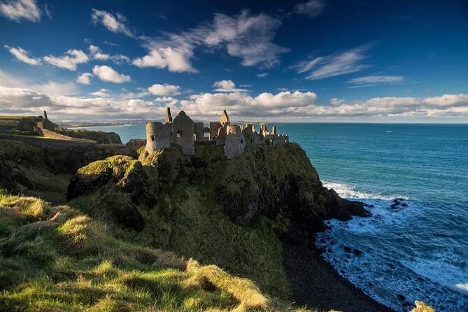 Experience the Antrim Coast and the Land of Giants - Private Tour - Dunluce Castle turns ruins into a story