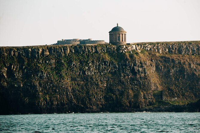 Full Day Private Luxury Tour of Causeway Coast (Giants Causeway) - Dunluce Castle above the sea