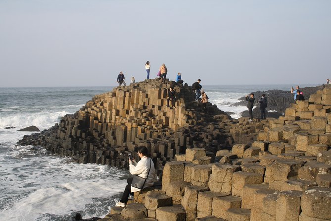Giant's Causeway Day Tour and Belfast City Tour 1 Day Pass - Carrickfergus Castle and the first taste of the coast