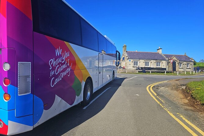 Giant's Causeway Day Tour and Belfast City Tour 1 Day Pass - Belfast’s major stops, from Titanic to the Peace Wall