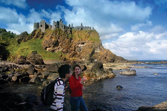 Giant’s Causeway Day Trip from Belfast - Dunluce Castle brings drama without a long visit