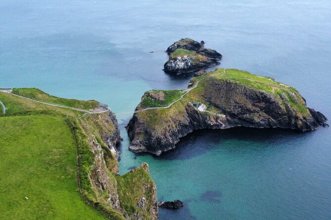Giants Causeway Tour from Belfast in luxury 7 seater - Dunluce Castle above the sea