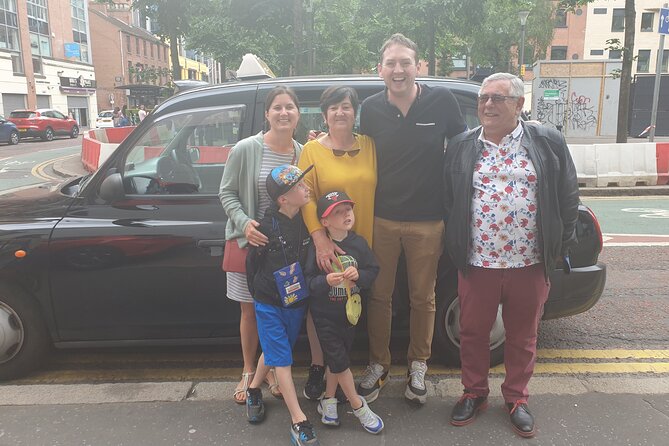 Iconic Belfast Black Cab Tour - Signing your name at the Peace Wall
