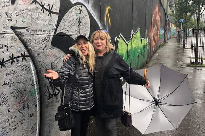 Official World Famous Belfast Taxi Tour ™ - The Peace Wall and the meaning of a signed message